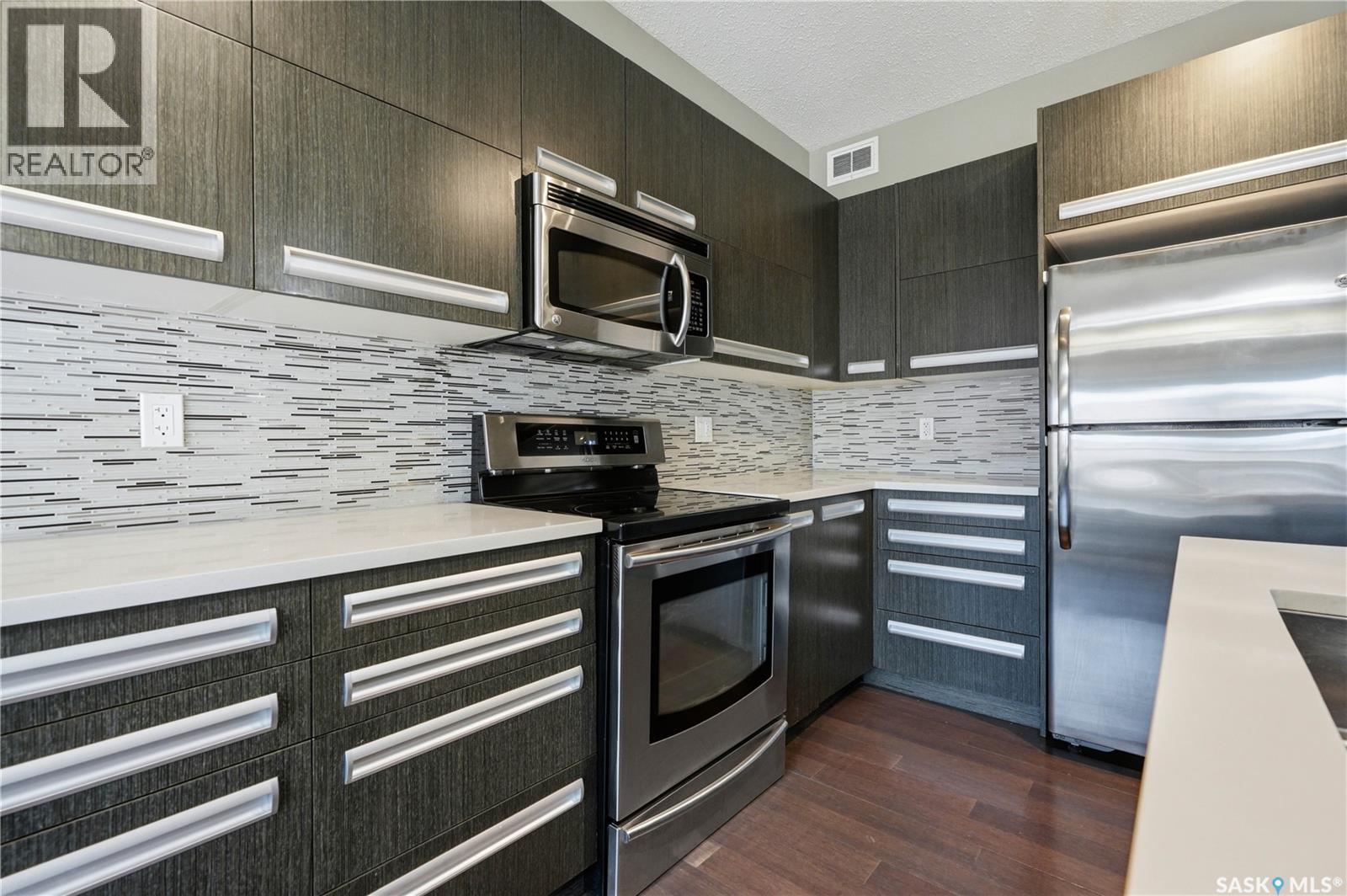 924 Stonebridge Common, Saskatoon, SK - Indoor Photo Showing Kitchen With Stainless Steel Kitchen With Upgraded Kitchen
