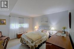 Primary Bedroom, large window and closet -