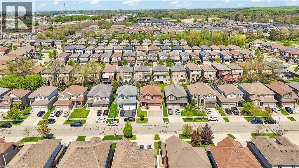 Aerial perspective showcasing a residential development with numerous single-family homes - 73 Fitzgerald Drive, Cambridge, ON - Outdoor With View