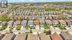 Aerial perspective showcasing a residential development with numerous single-family homes -