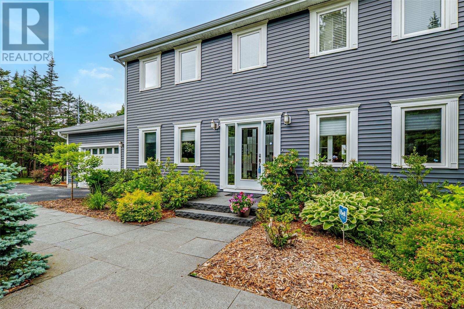 Custom designed front entrance is very welcoming to anyone. - 131-139 Marine Drive, Logy Bay, Middle Cove, Outer Cove, NL - Outdoor