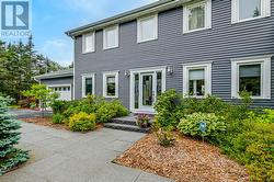 Custom designed front entrance is very welcoming to anyone. -