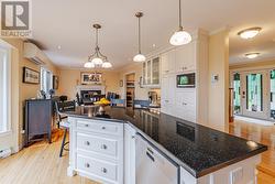 Spacious island features storage and seating for 3-4 -
