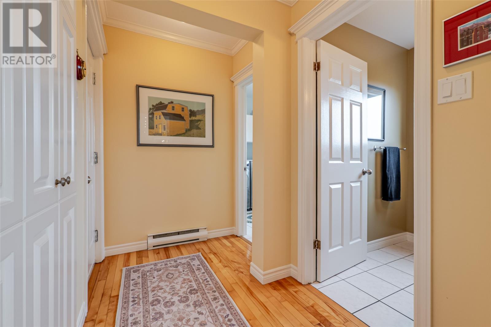 Hall off the kitchen leading to 1/2 bath, laundry, and garage. - 131-139 Marine Drive, Logy Bay, Middle Cove, Outer Cove, NL - Indoor Photo Showing Other Room