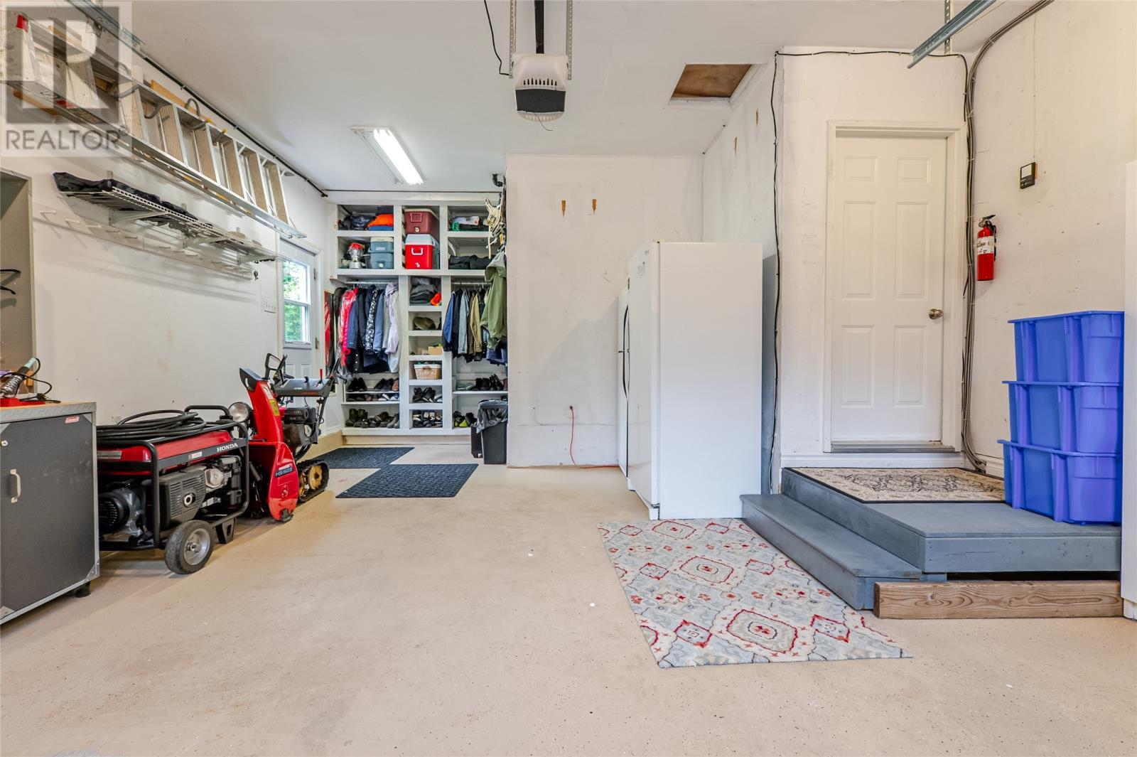 Garage with ton's of storage - 131-139 Marine Drive, Logy Bay, Middle Cove, Outer Cove, NL - Indoor Photo Showing Garage