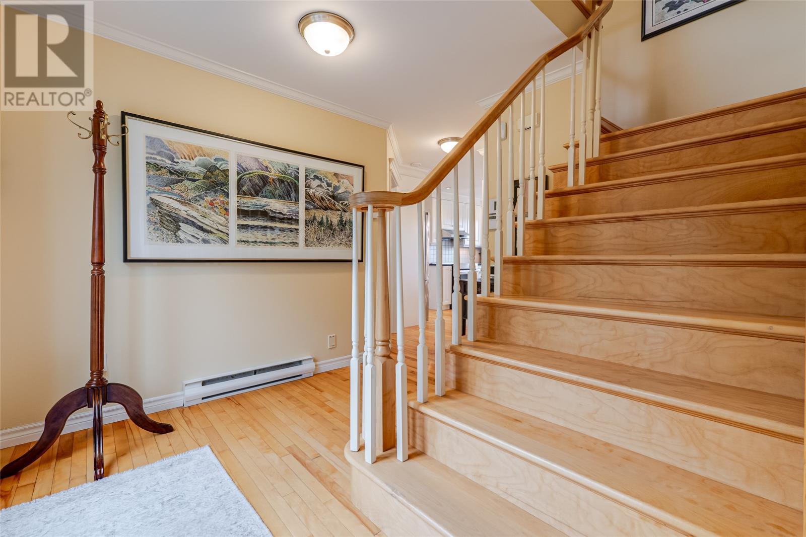 Main hardwood stairs - 131-139 Marine Drive, Logy Bay, Middle Cove, Outer Cove, NL - Indoor Photo Showing Other Room