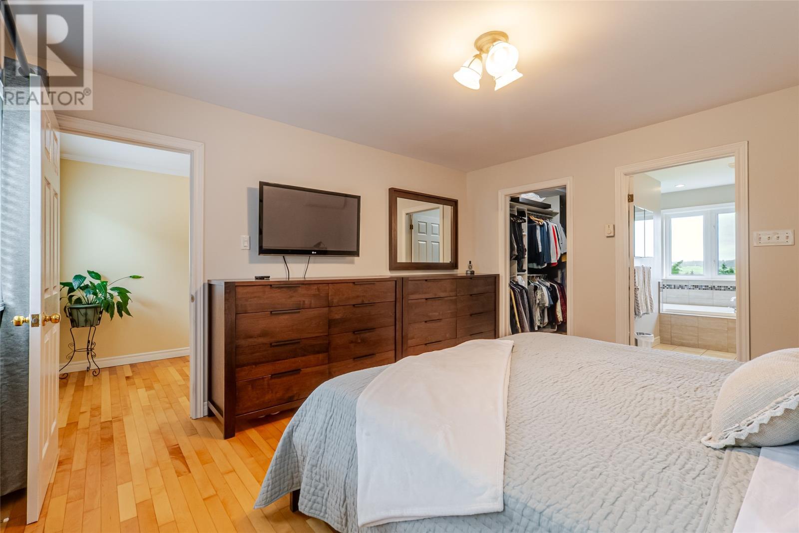 A Walk-in closet and full ensuite - 131-139 Marine Drive, Logy Bay, Middle Cove, Outer Cove, NL - Indoor Photo Showing Bedroom