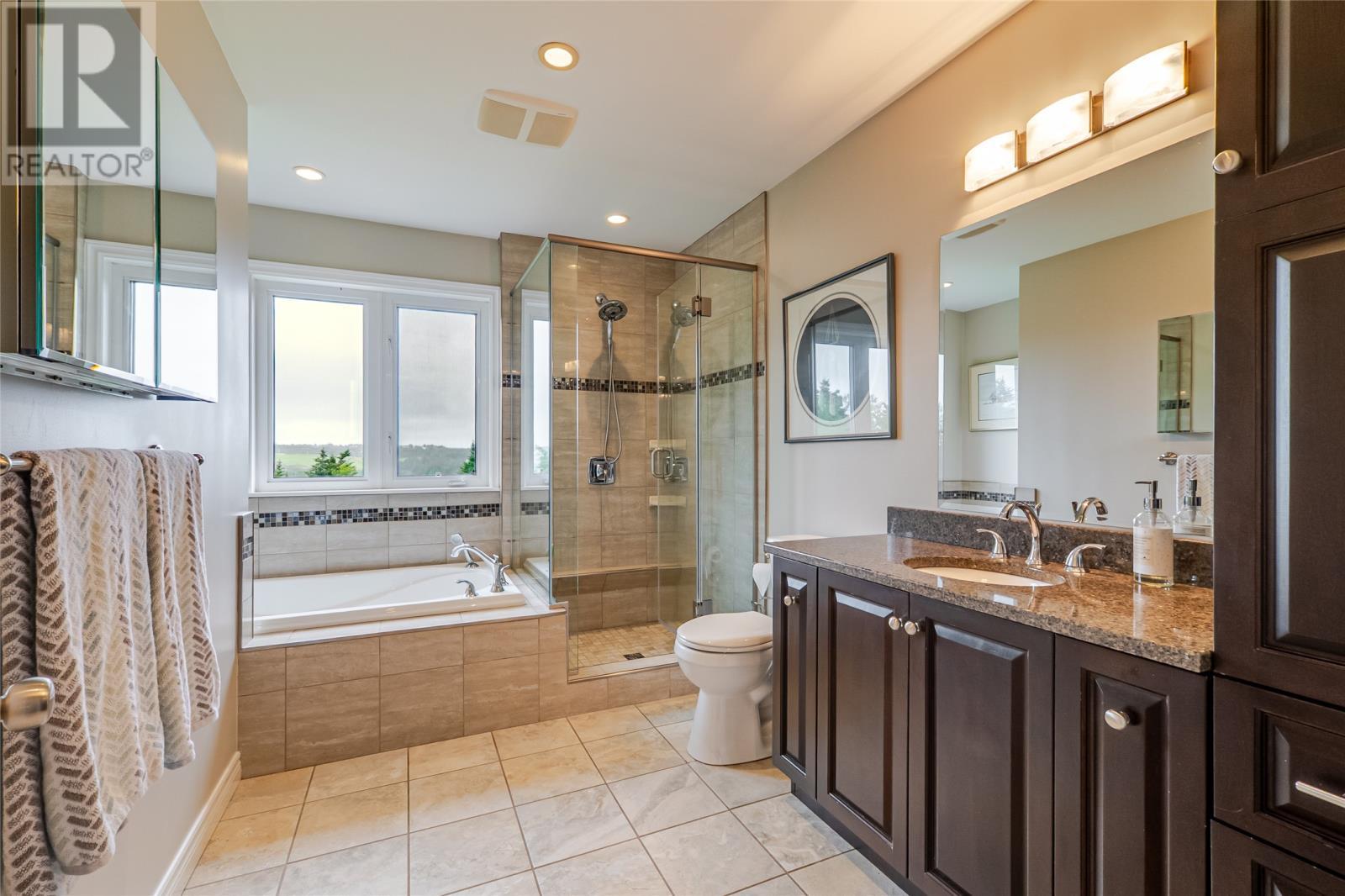 New custom ensuite with heated flooring and custom shower - 131-139 Marine Drive, Logy Bay, Middle Cove, Outer Cove, NL - Indoor Photo Showing Bathroom