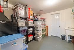 Storage room with laundry tub -