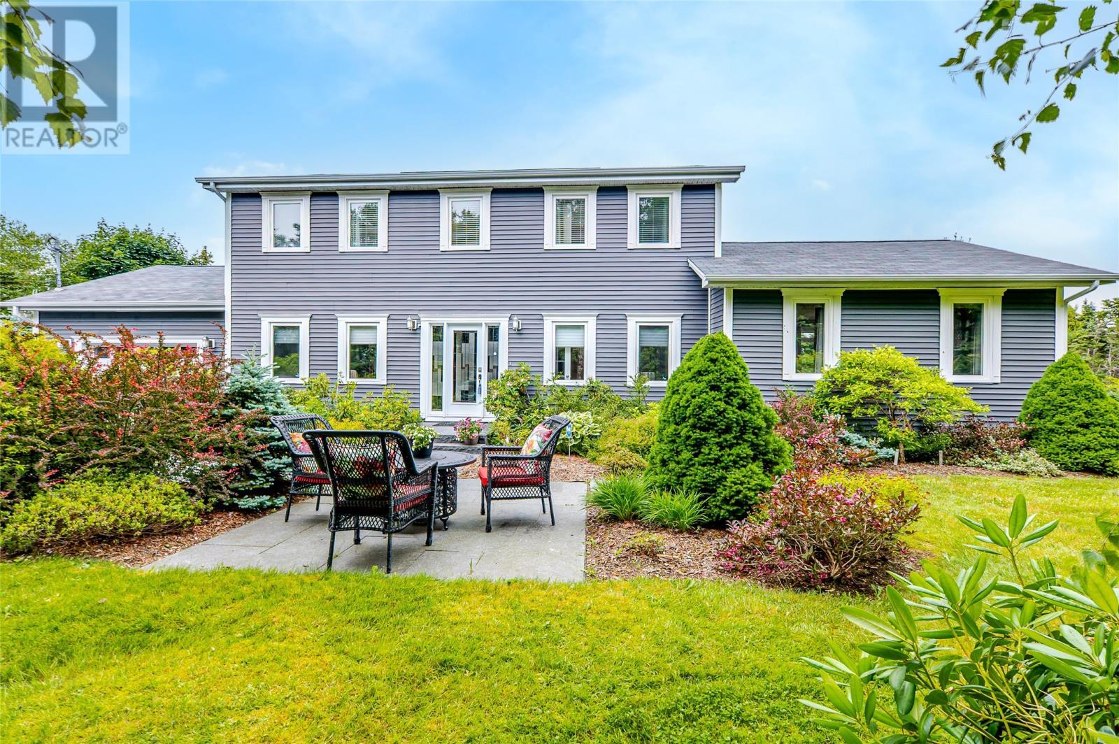 Welcoming front landscaping and seating area - 131-139 Marine Drive, Logy Bay, Middle Cove, Outer Cove, NL - Outdoor