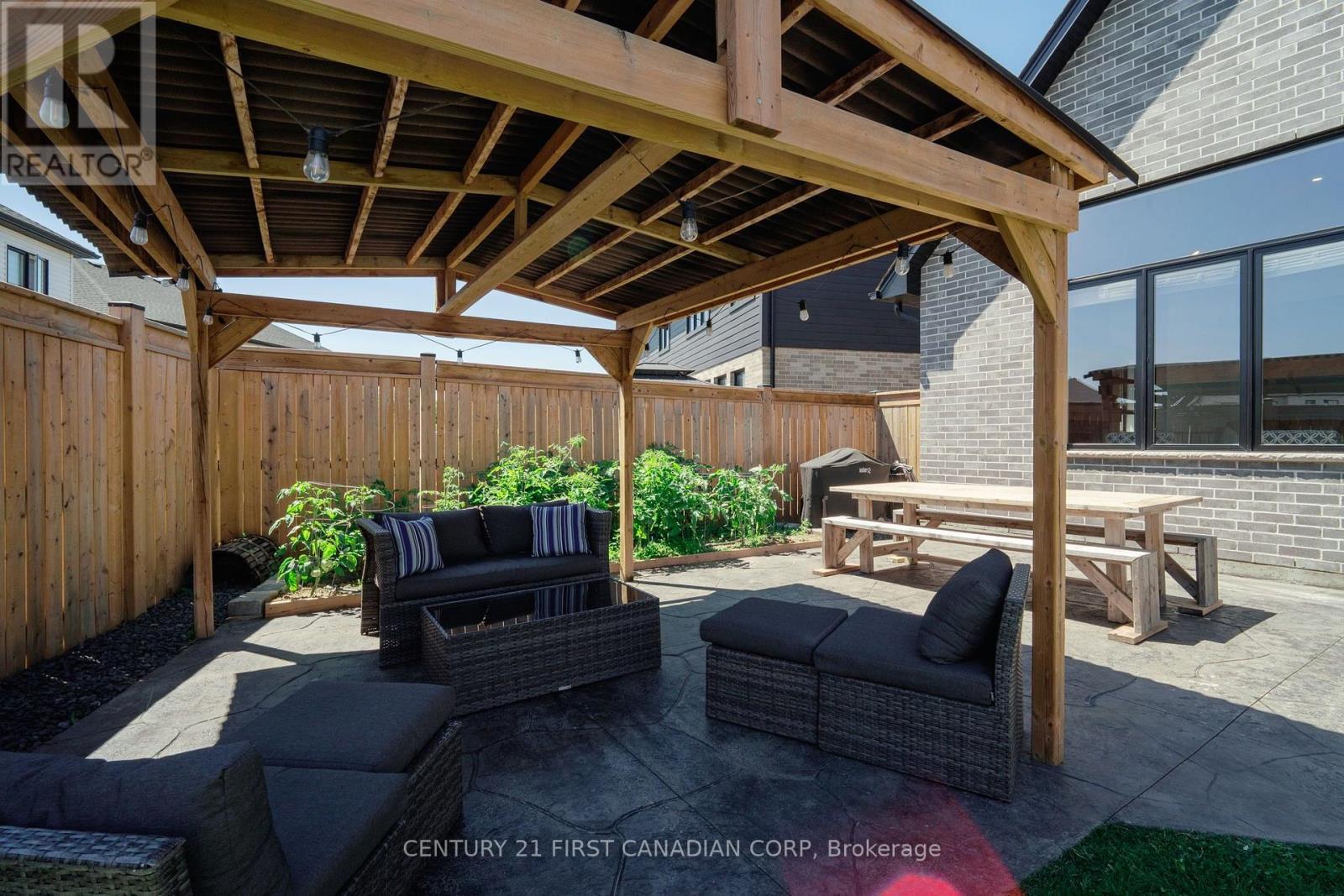 Stamped Concrete Patio - 126 Aspen Circle, Thames Centre, ON - Outdoor With Deck Patio Veranda With Exterior