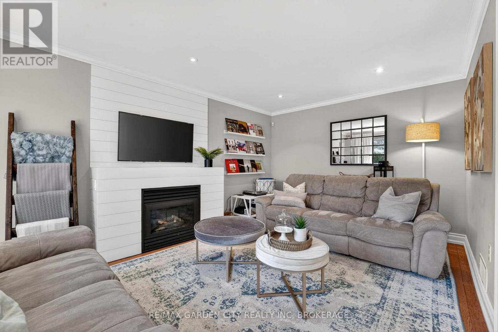 734 Brigadoon Drive, Hamilton (Gourley), ON - Indoor Photo Showing Living Room With Fireplace