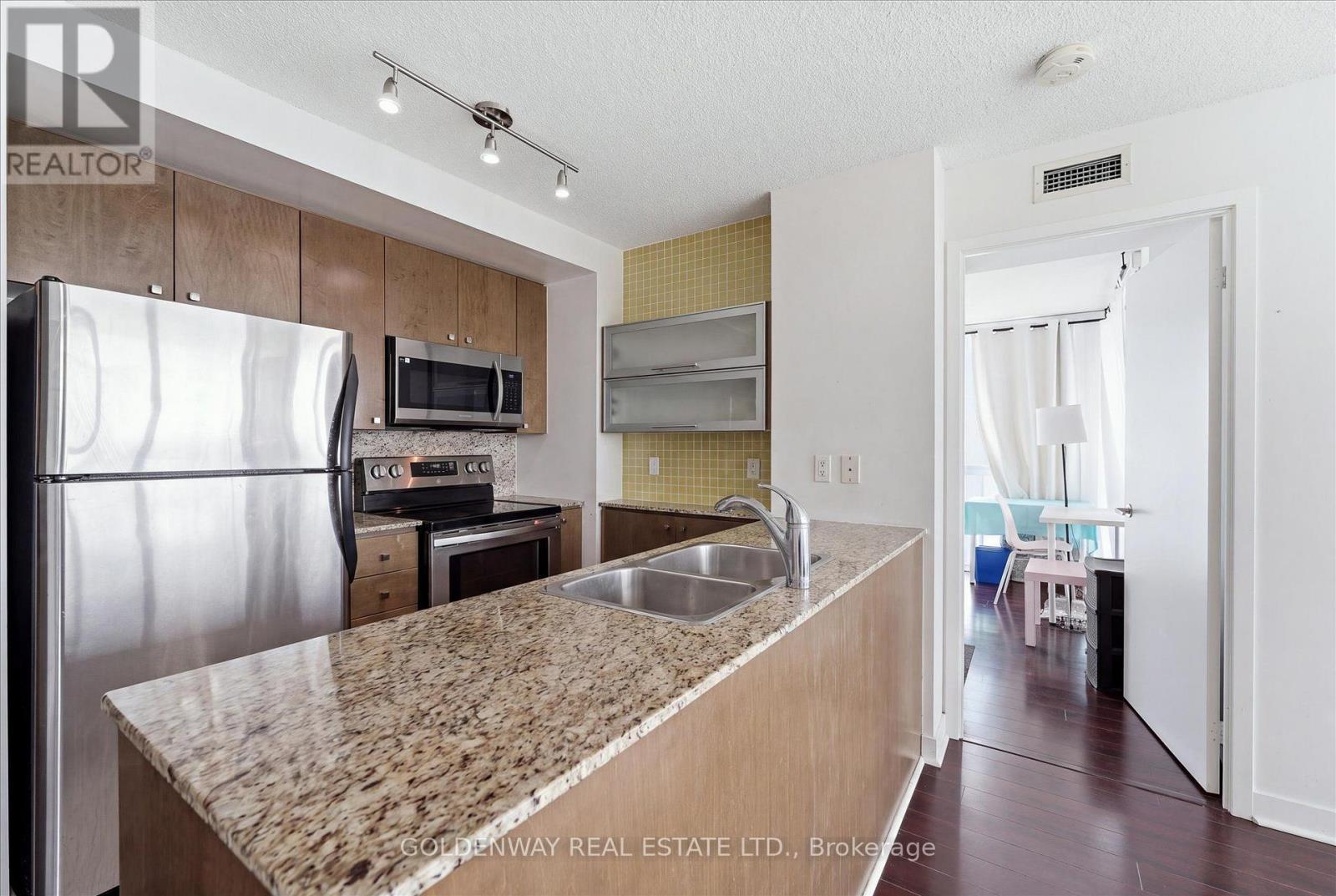 5015 - 11 Brunel Court, Toronto, ON - Indoor Photo Showing Kitchen With Double Sink With Upgraded Kitchen
