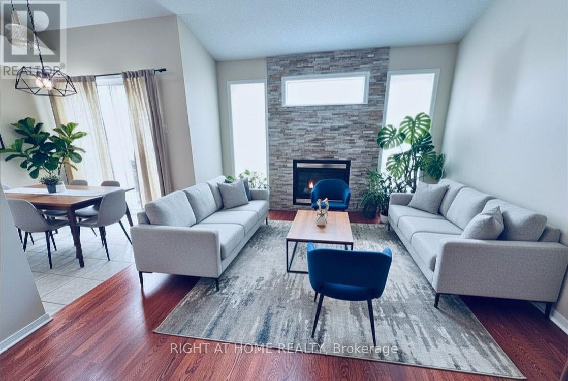 1741 Jobin Crescent, Ottawa, ON - Indoor Photo Showing Living Room With Fireplace