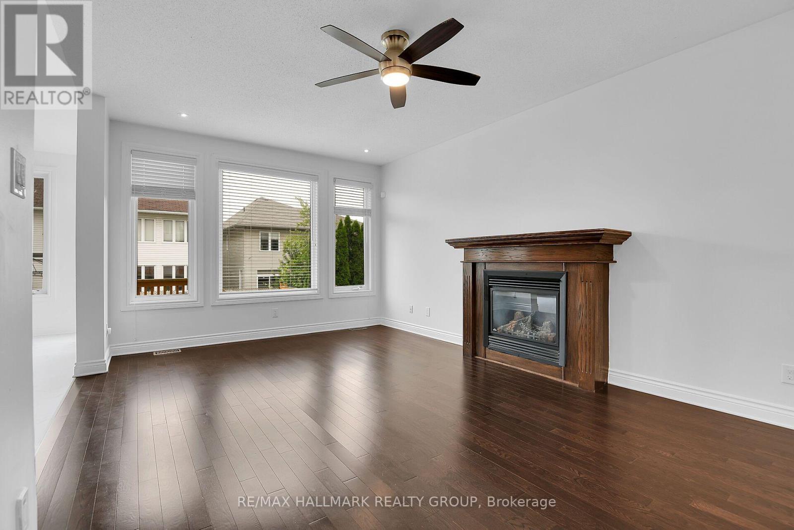 155 Whernside Terrace, Ottawa, ON - Indoor Photo Showing Living Room With Fireplace