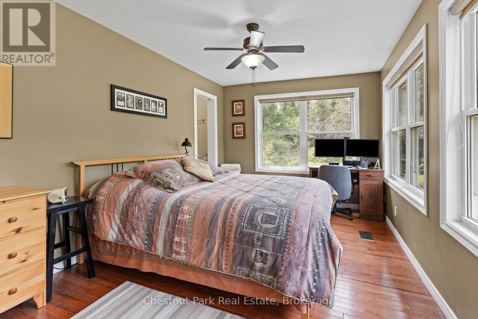 Primary Suite with Windows on 2 Sides - 8488 County Road 503 Road, Highlands East (Glamorgan), ON - Indoor Photo Showing Bedroom