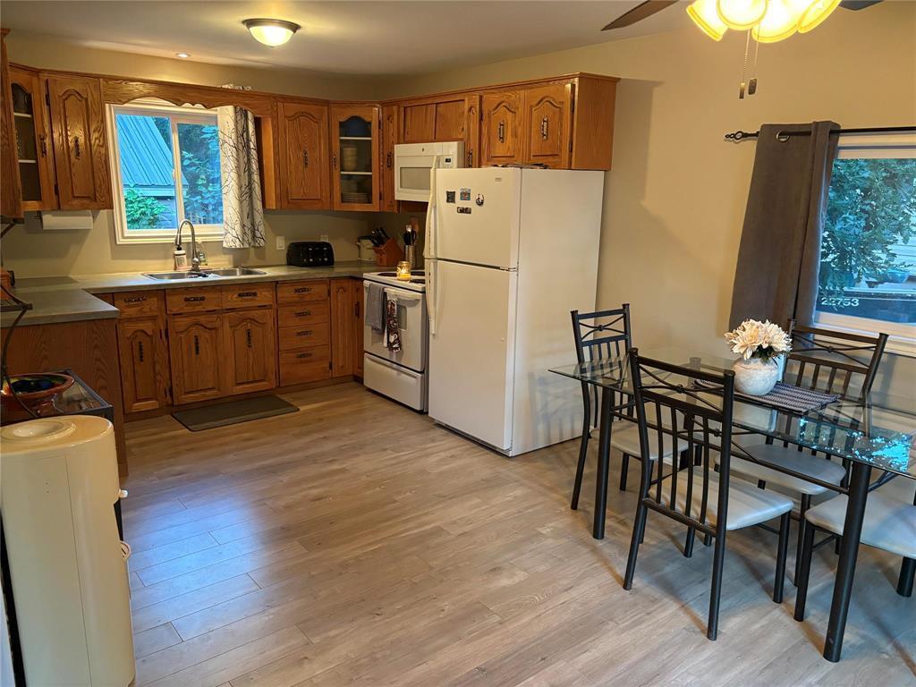 110 Spruce Street, Pelican Lake, MB - Indoor Photo Showing Kitchen With Double Sink