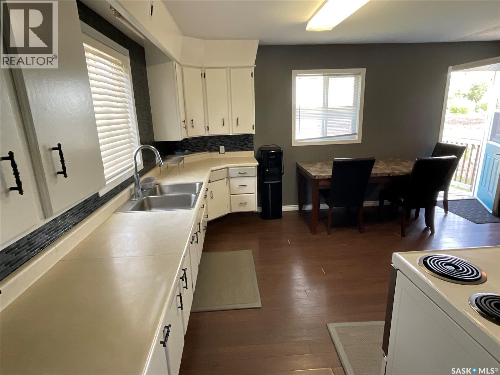 217 3Rd Street N, Wakaw, SK - Indoor Photo Showing Kitchen With Double Sink