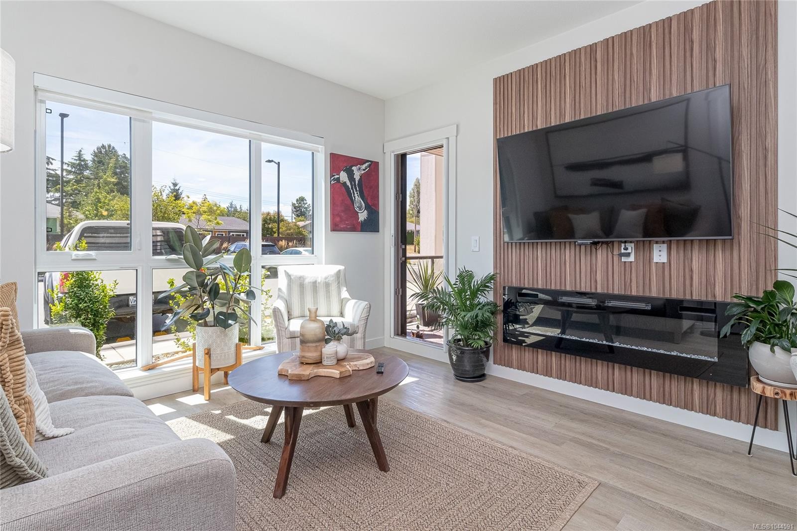 #106-120 Jensen Ave West, Parksville, BC - Indoor Photo Showing Living Room With Fireplace