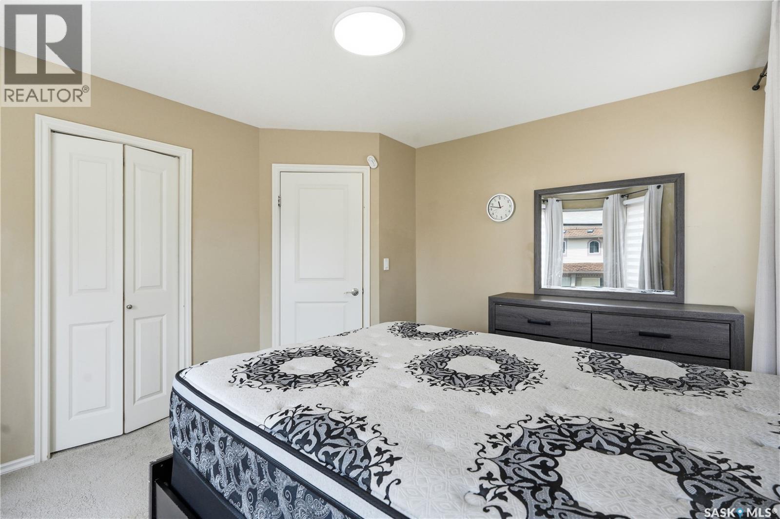 312 303 Slimmon Place, Saskatoon, SK - Indoor Photo Showing Bedroom