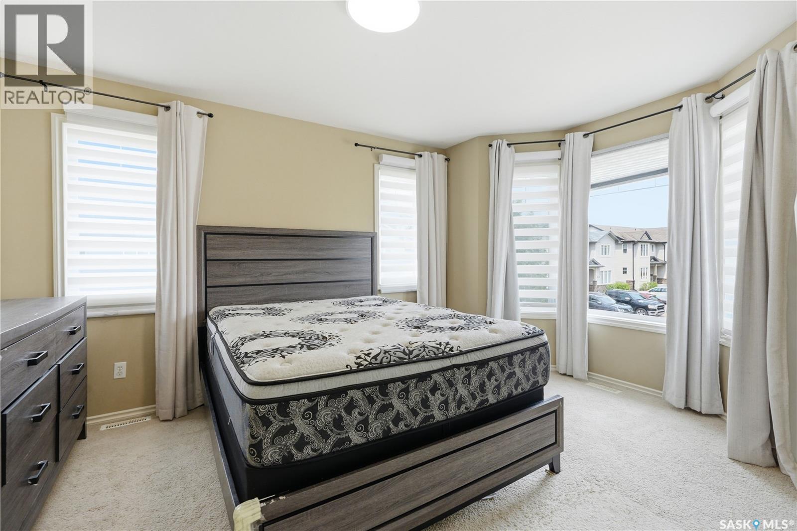 312 303 Slimmon Place, Saskatoon, SK - Indoor Photo Showing Bedroom
