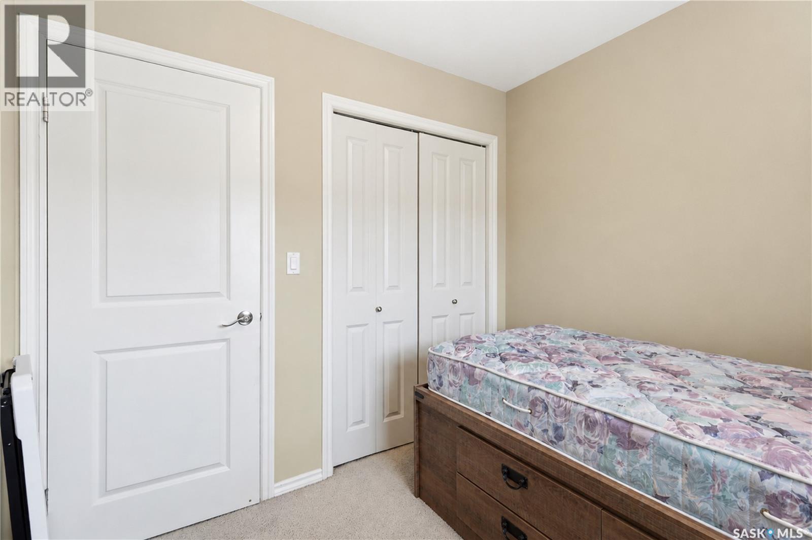 312 303 Slimmon Place, Saskatoon, SK - Indoor Photo Showing Bedroom