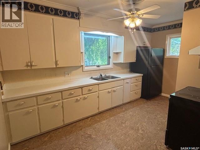 722 1St Street, Canora, SK - Indoor Photo Showing Kitchen With Double Sink