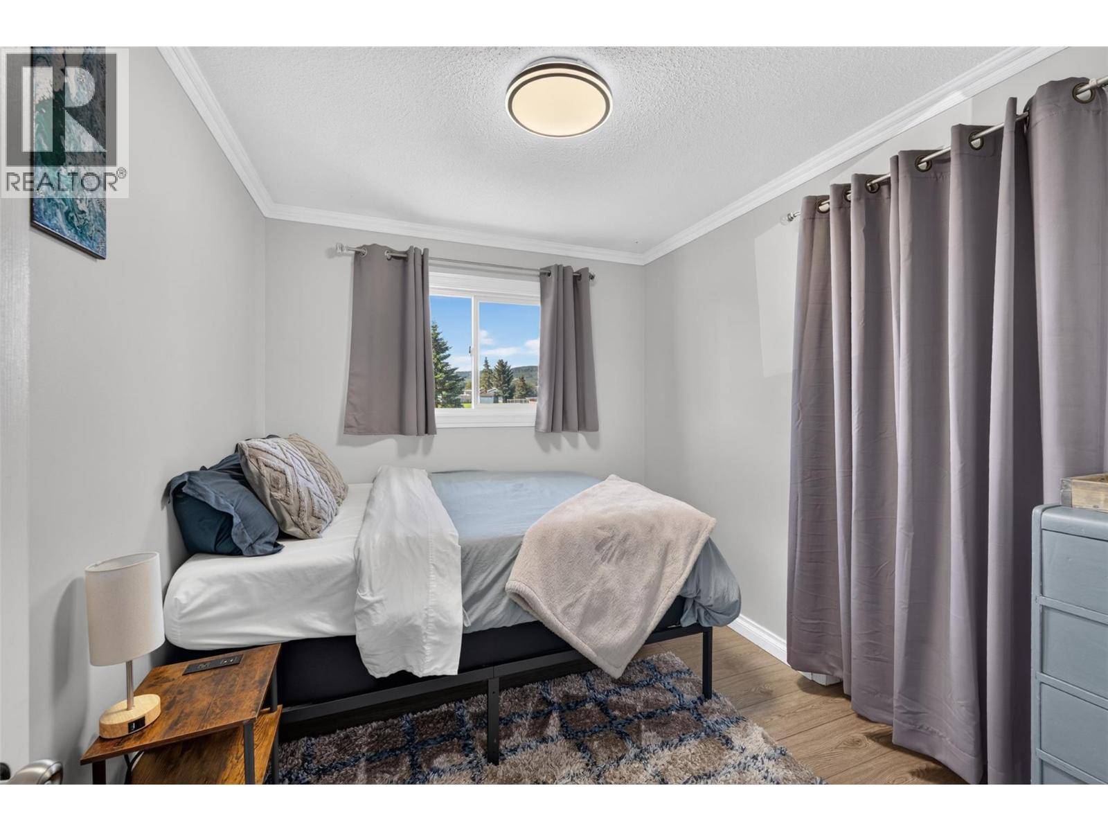 1128 118 Avenue, Dawson Creek, BC - Indoor Photo Showing Bedroom