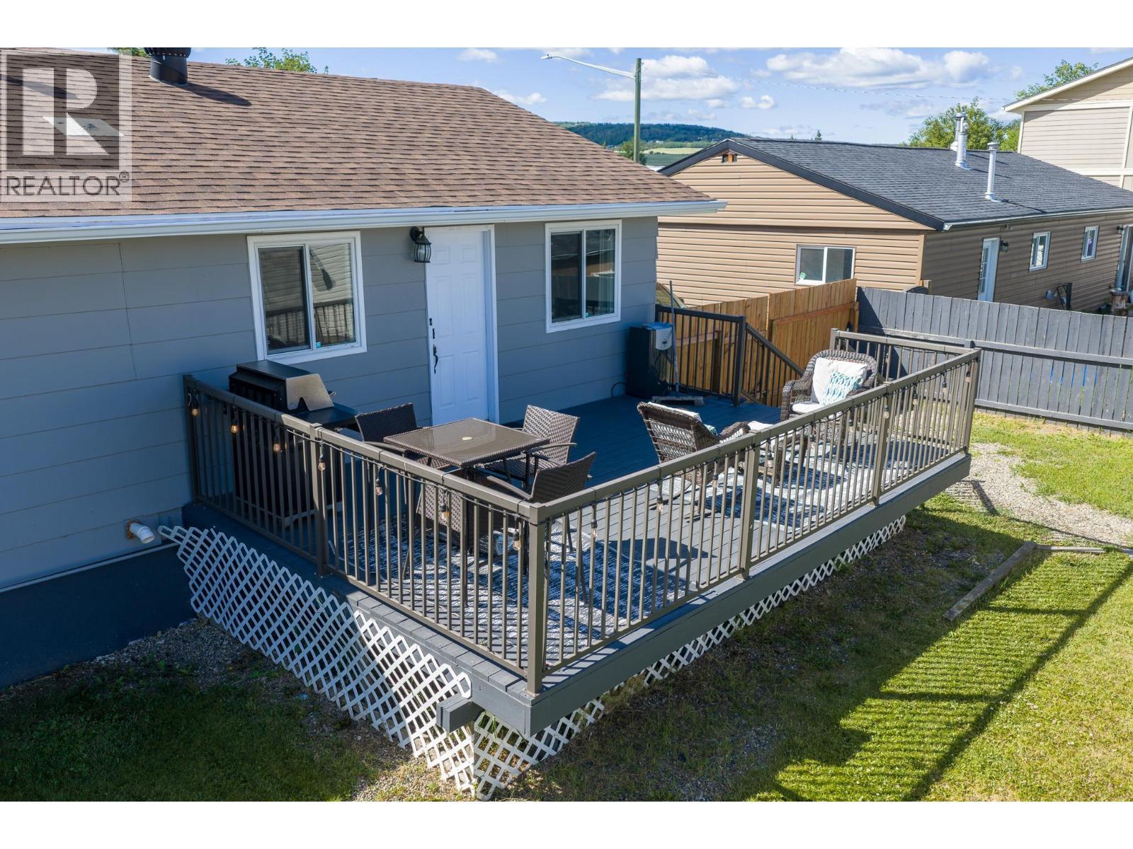 1128 118 Avenue, Dawson Creek, BC - Outdoor With Deck Patio Veranda With Exterior