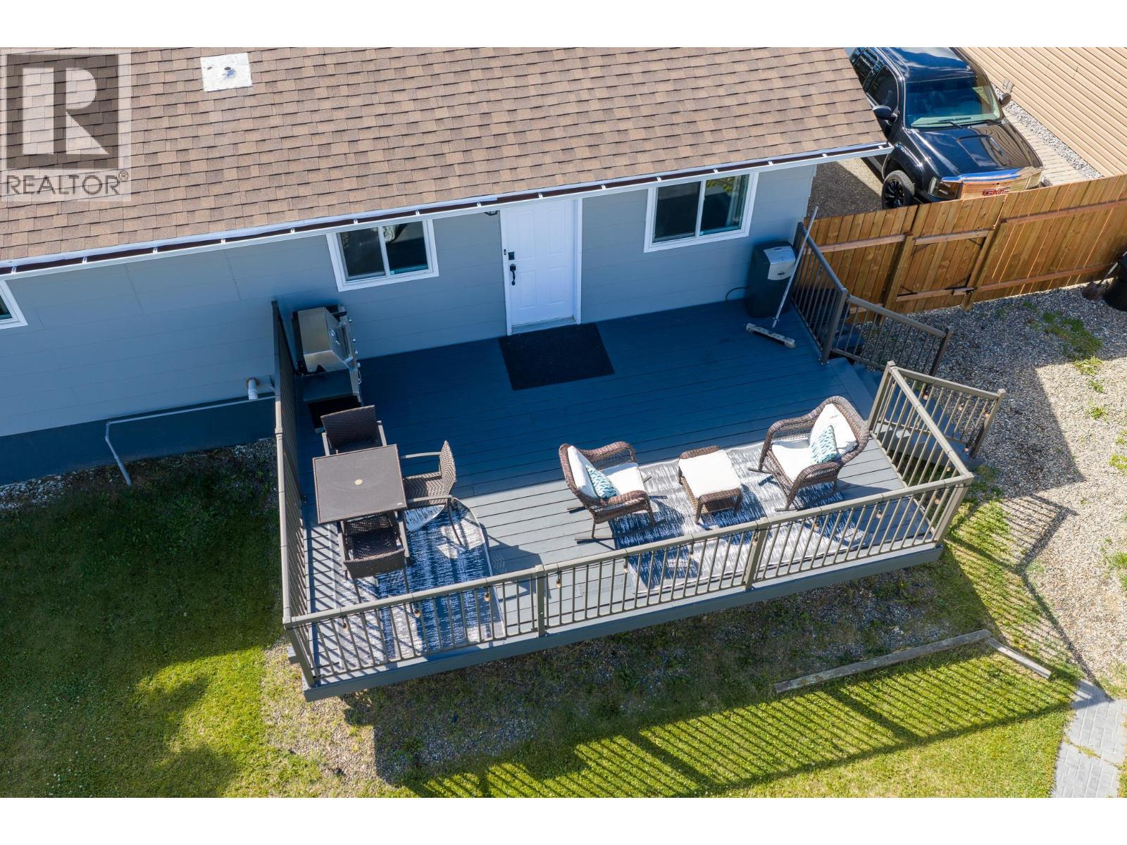 1128 118 Avenue, Dawson Creek, BC - Outdoor With Deck Patio Veranda With Exterior