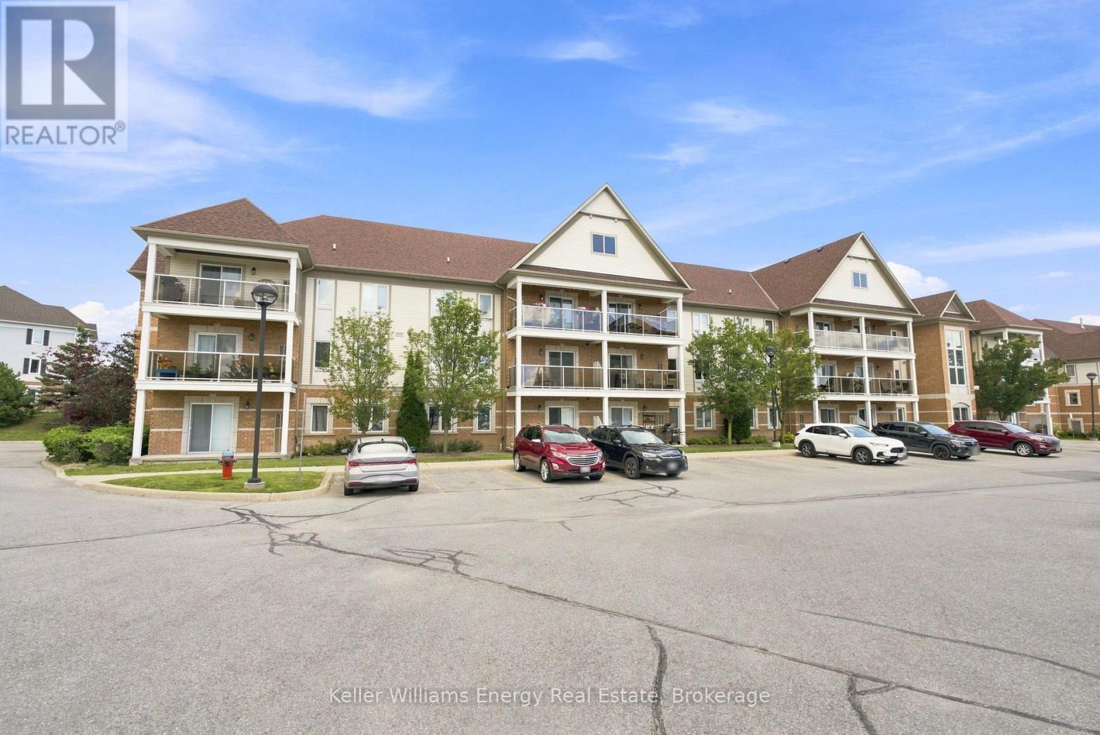 204 - 124 Aspen Springs Drive, Clarington (Bowmanville), ON - Outdoor With Balcony With Facade