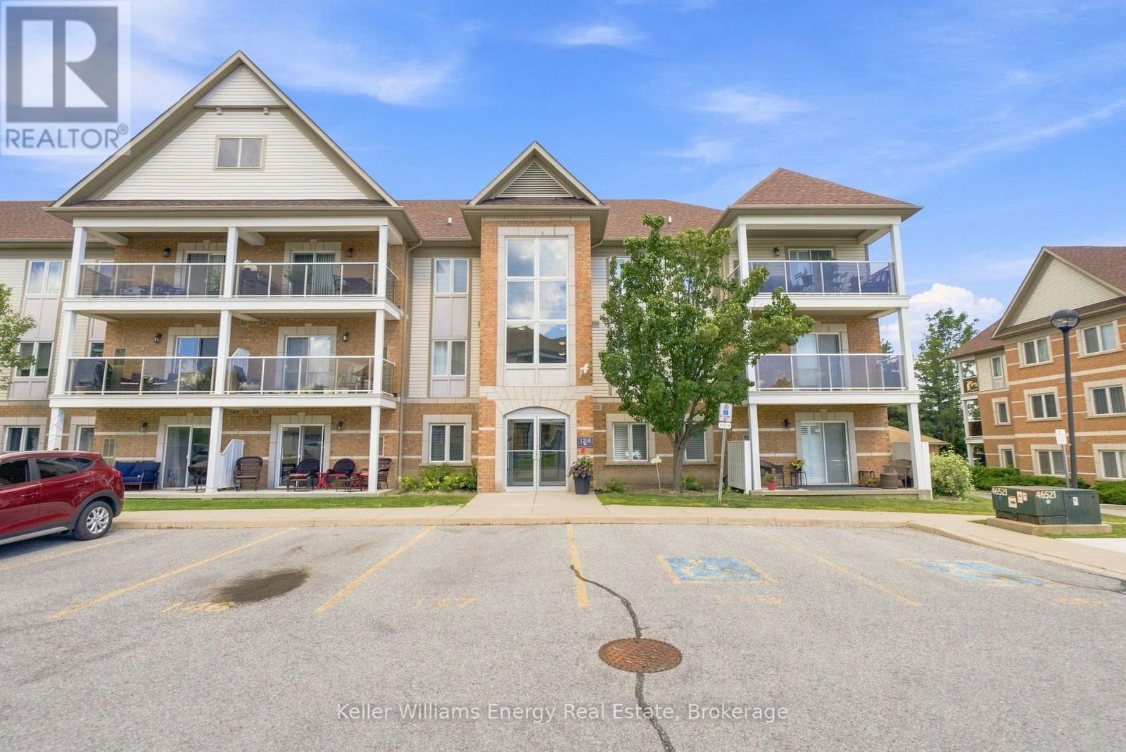 204 - 124 Aspen Springs Drive, Clarington (Bowmanville), ON - Outdoor With Balcony With Facade