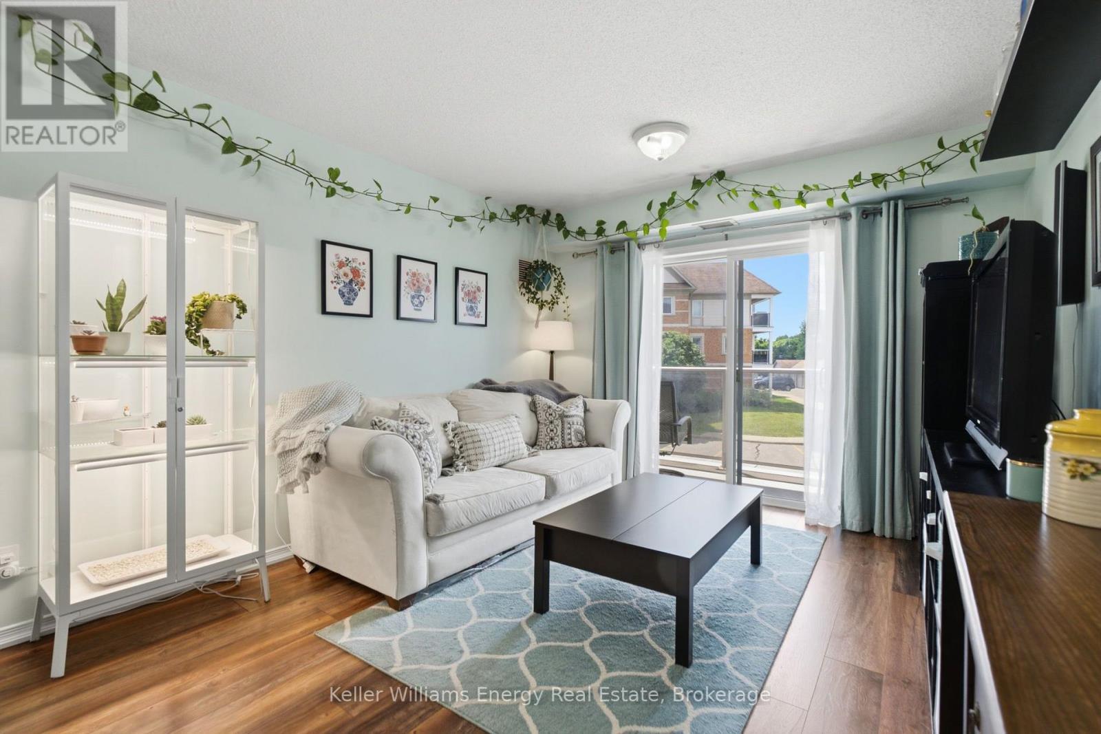 Open Concept Living/Dining - 204 - 124 Aspen Springs Drive, Clarington (Bowmanville), ON - Indoor Photo Showing Living Room