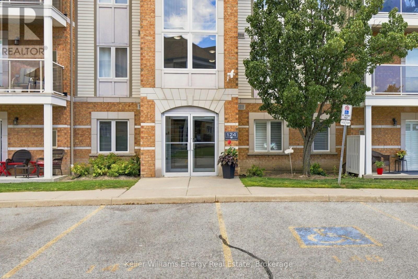204 - 124 Aspen Springs Drive, Clarington (Bowmanville), ON - Outdoor With Balcony With Facade