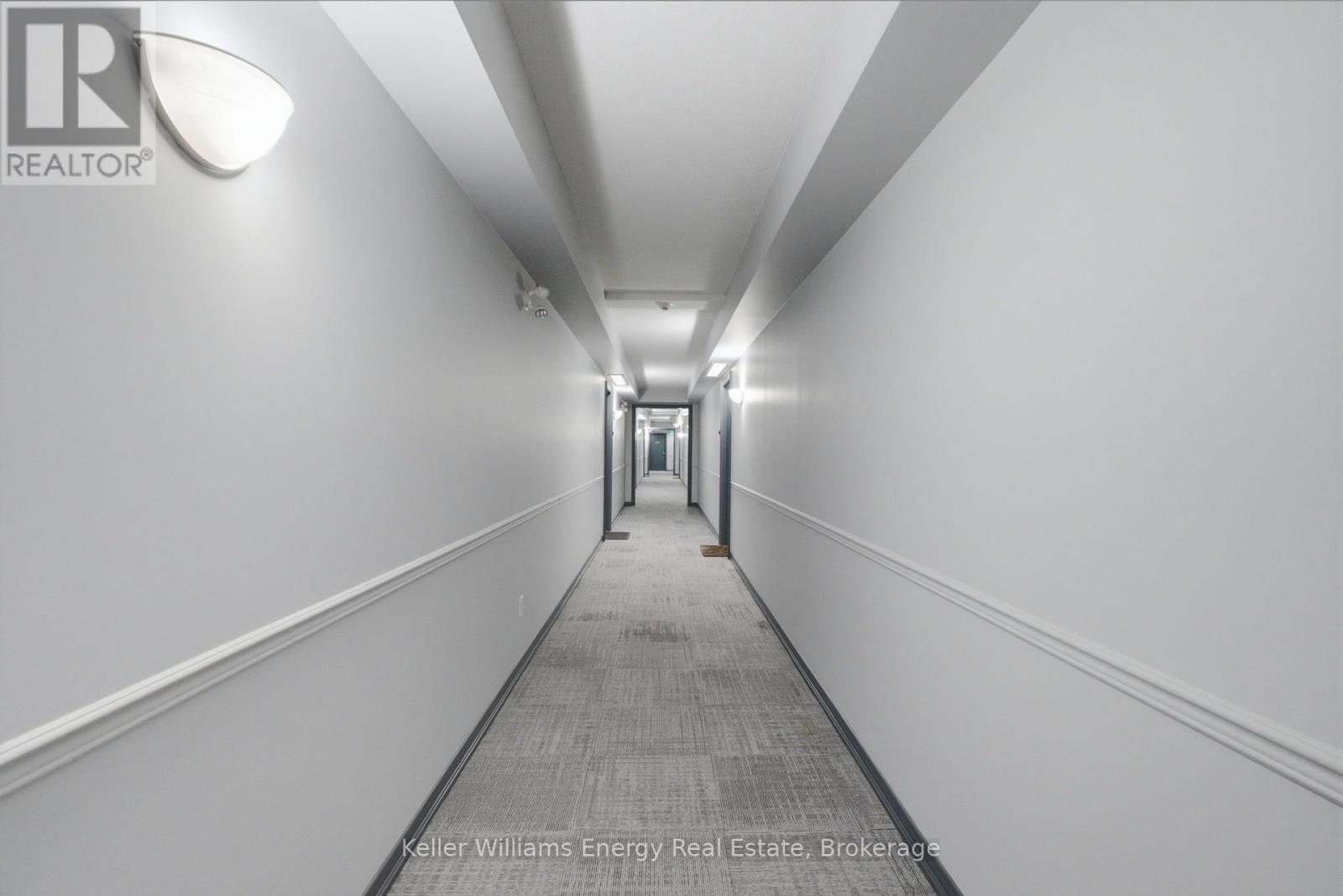 Common Area Hallway - 204 - 124 Aspen Springs Drive, Clarington (Bowmanville), ON - Indoor Photo Showing Other Room
