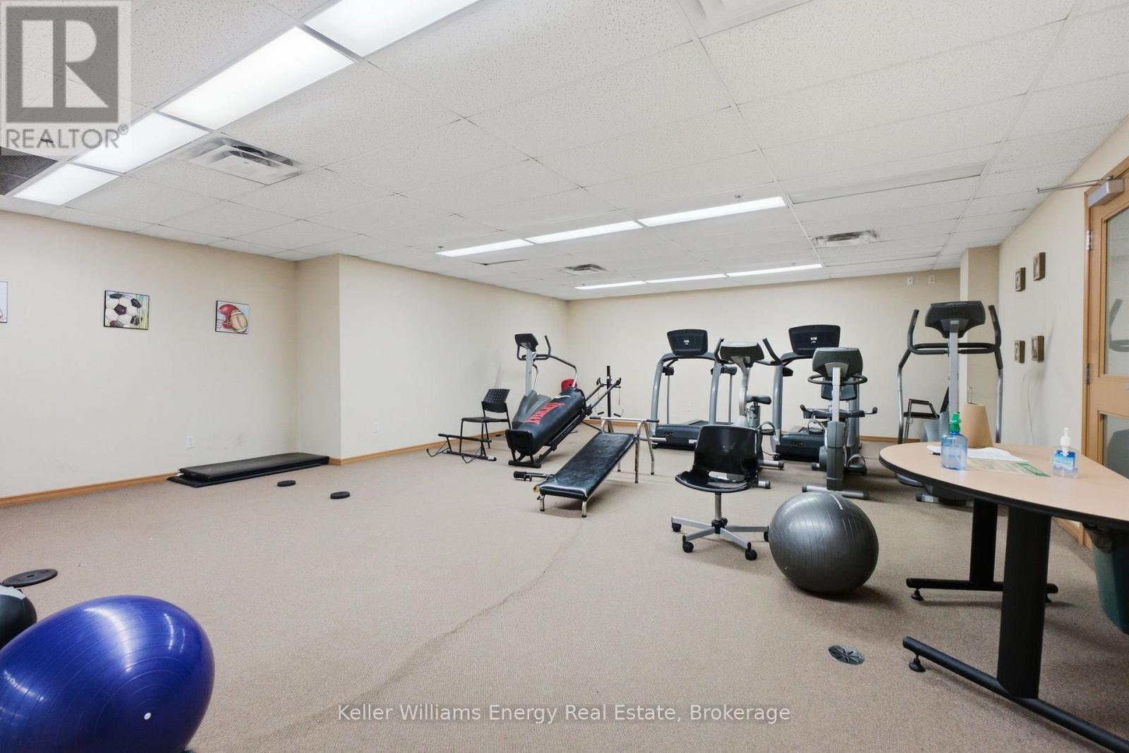 Fitness Centre in 128 Aspen Springs - 204 - 124 Aspen Springs Drive, Clarington (Bowmanville), ON - Indoor Photo Showing Gym Room