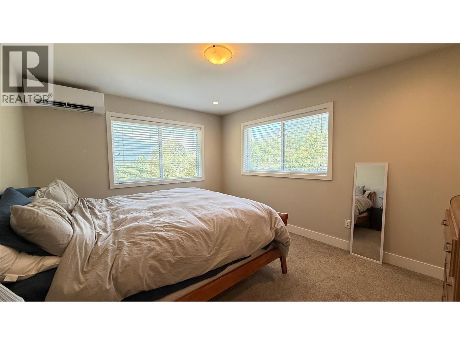 2410 Perrier Lane Unit# A, Nelson, BC - Indoor Photo Showing Bedroom