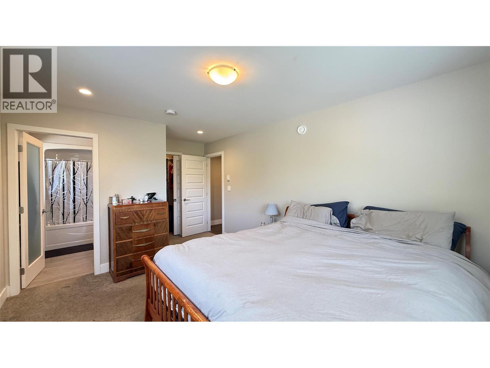 2410 Perrier Lane Unit# A, Nelson, BC - Indoor Photo Showing Bedroom