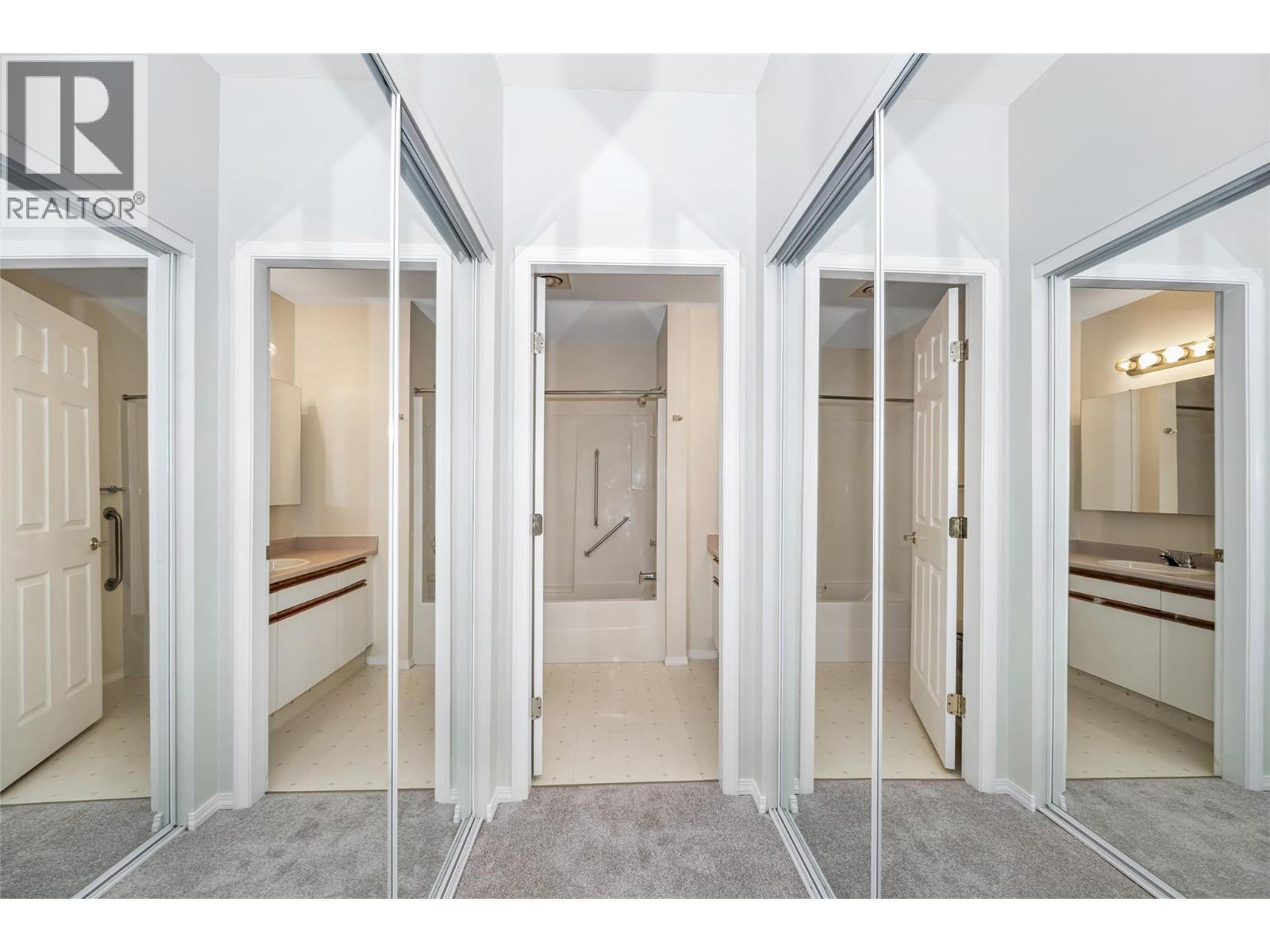 Master bedroom mirrored closet on both side - 3805 30 Avenue Unit# 112, Vernon, BC - Indoor