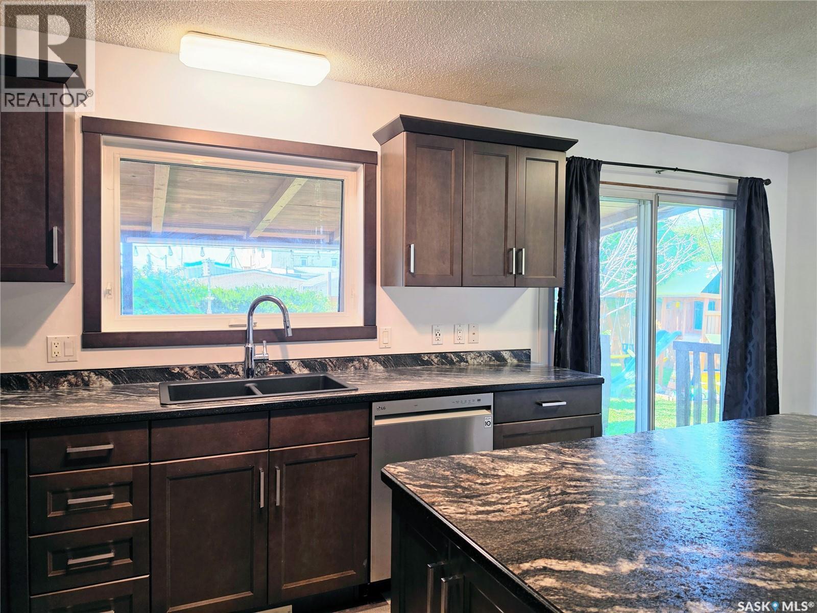 508 Mayer Street, Bruno, SK - Indoor Photo Showing Kitchen With Double Sink