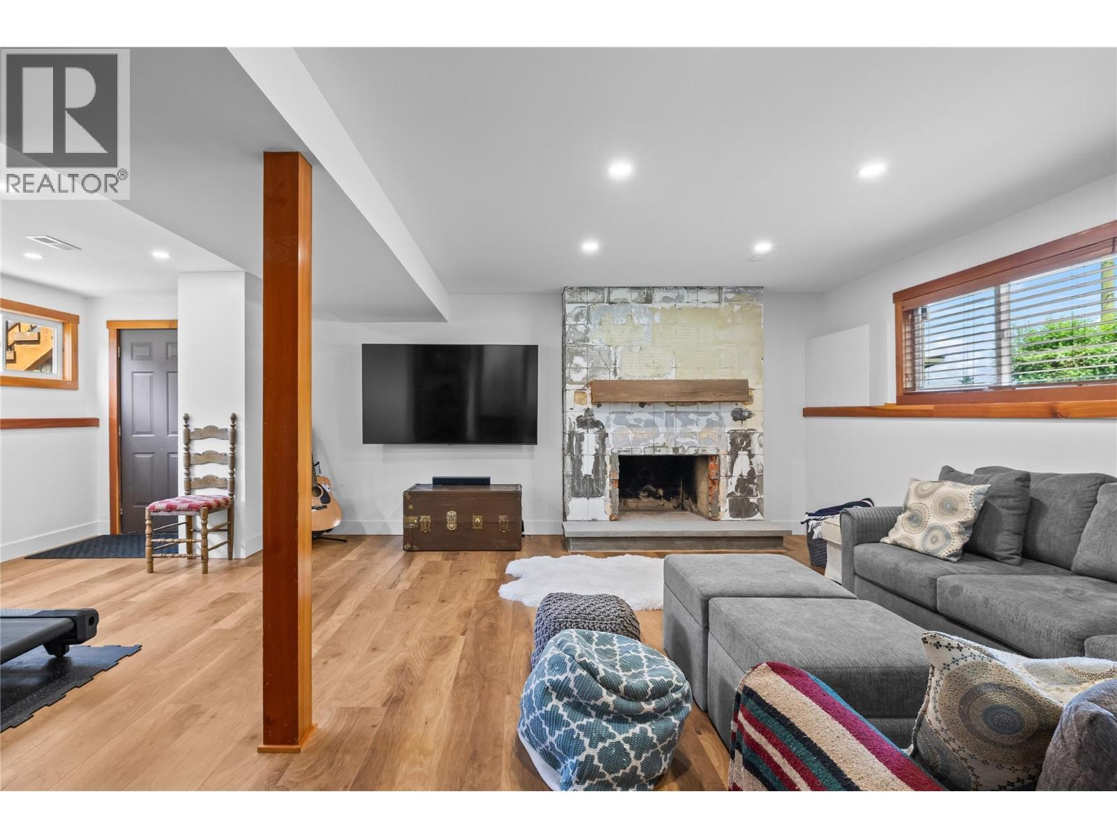 5054 Chute Lake Crescent, Kelowna, BC - Indoor Photo Showing Living Room With Fireplace
