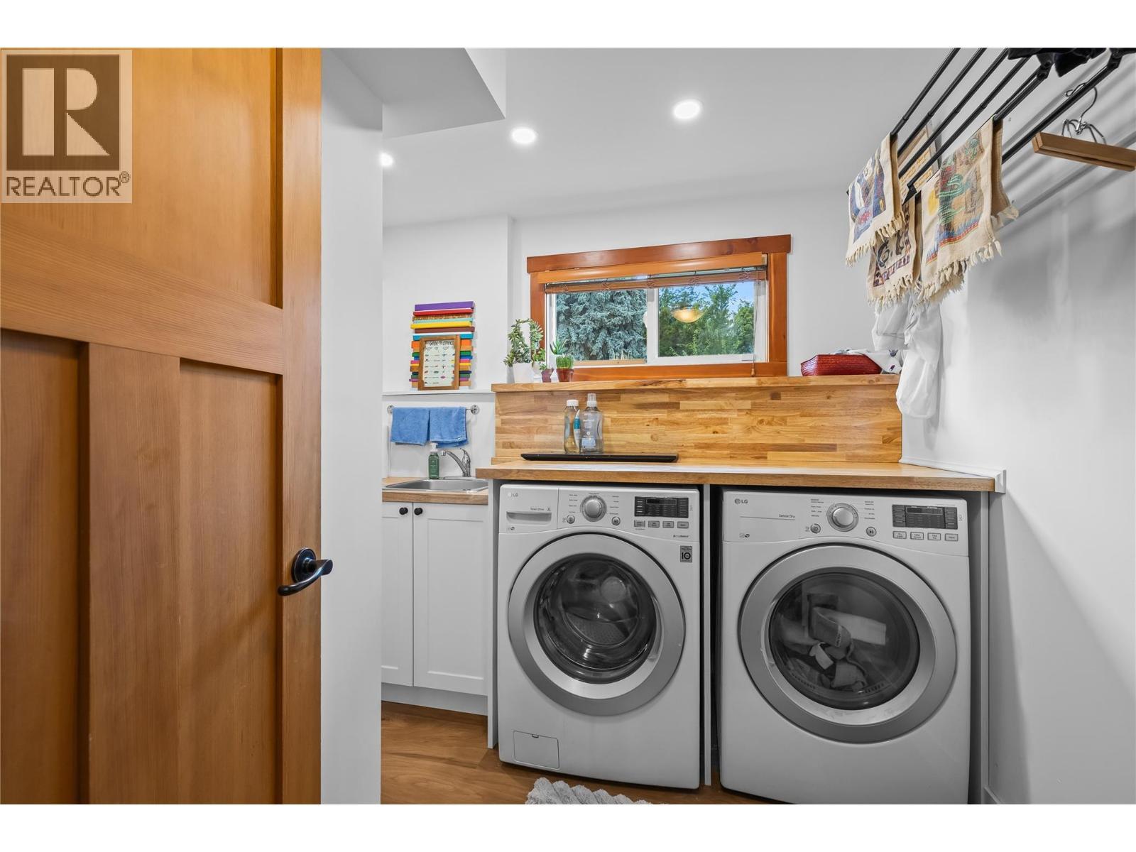 Laundry (Lower Level) - 5054 Chute Lake Crescent, Kelowna, BC - Indoor Photo Showing Laundry Room