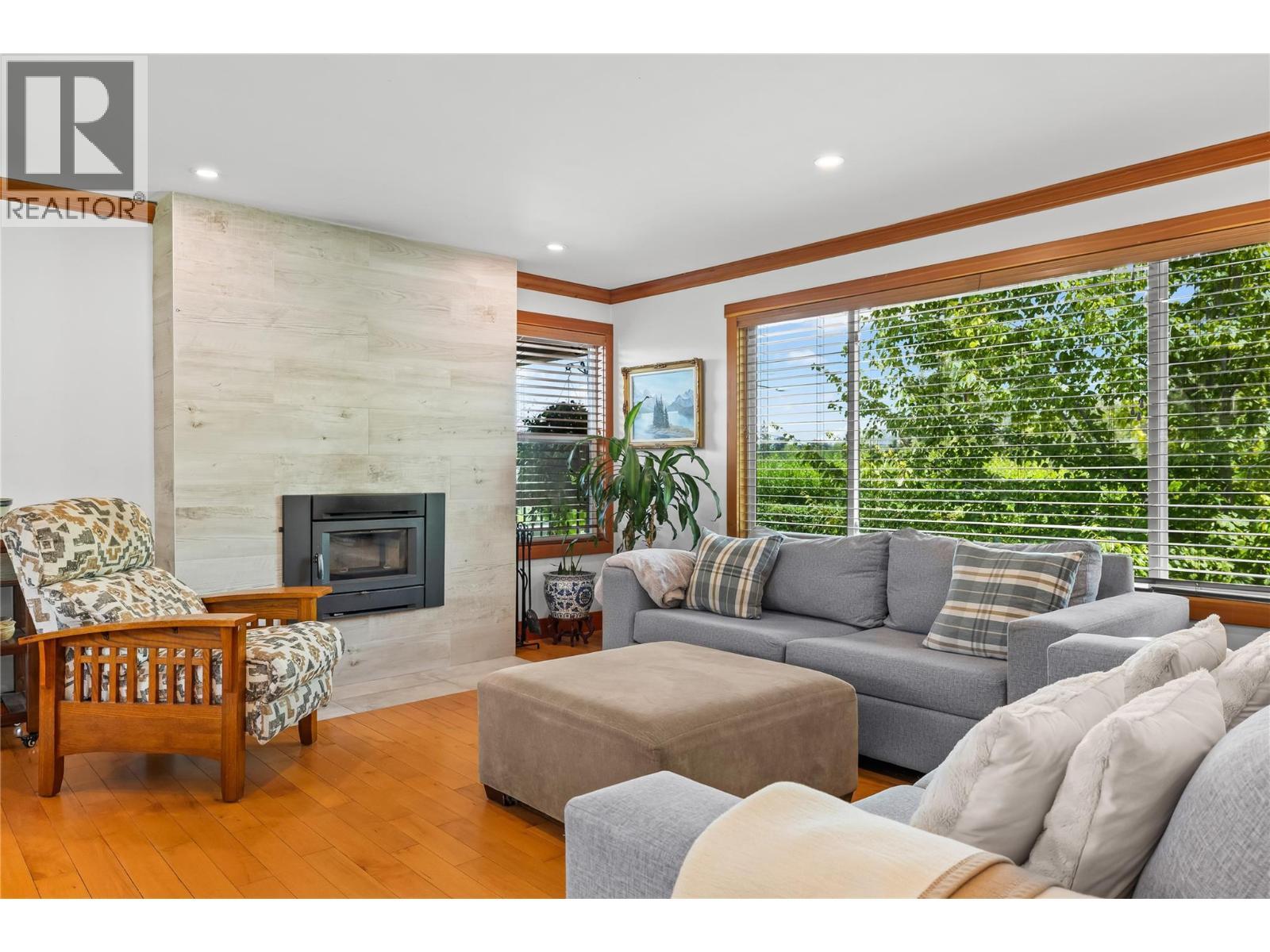 Main Floor Living Room - 5054 Chute Lake Crescent, Kelowna, BC - Indoor Photo Showing Living Room With Fireplace
