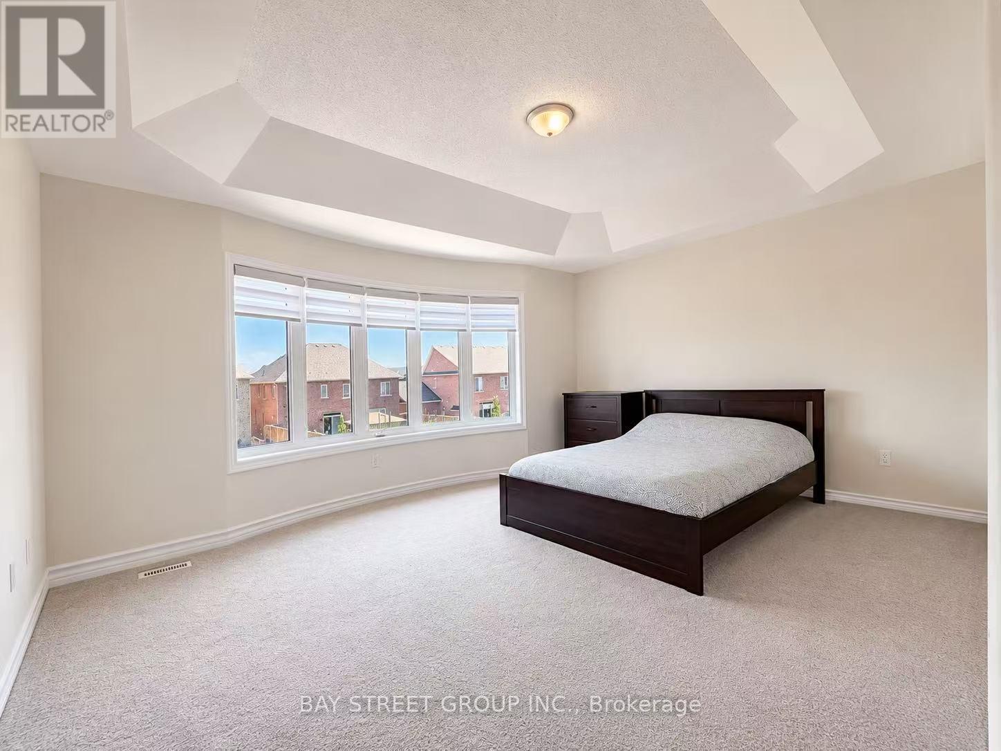 27 Samuel Crescent, Springwater, ON - Indoor Photo Showing Bedroom