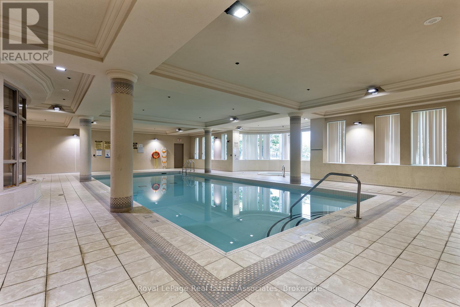 1707 - 4889 Kimbermount Avenue, Mississauga, ON - Indoor Photo Showing Other Room With In Ground Pool