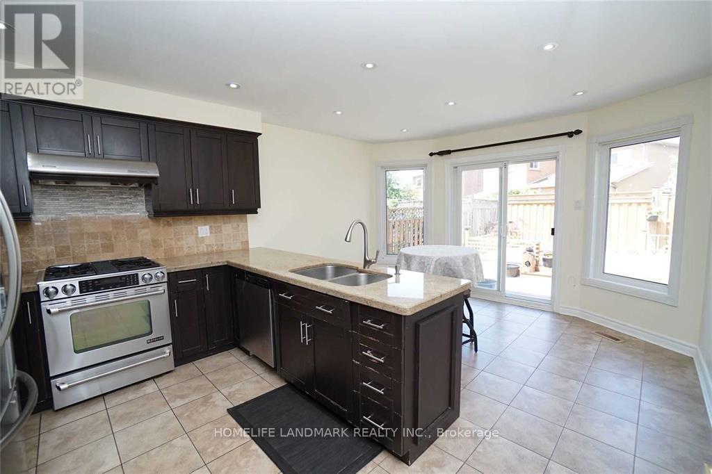 4887 Natkarni Crescent, Mississauga, ON - Indoor Photo Showing Kitchen With Double Sink