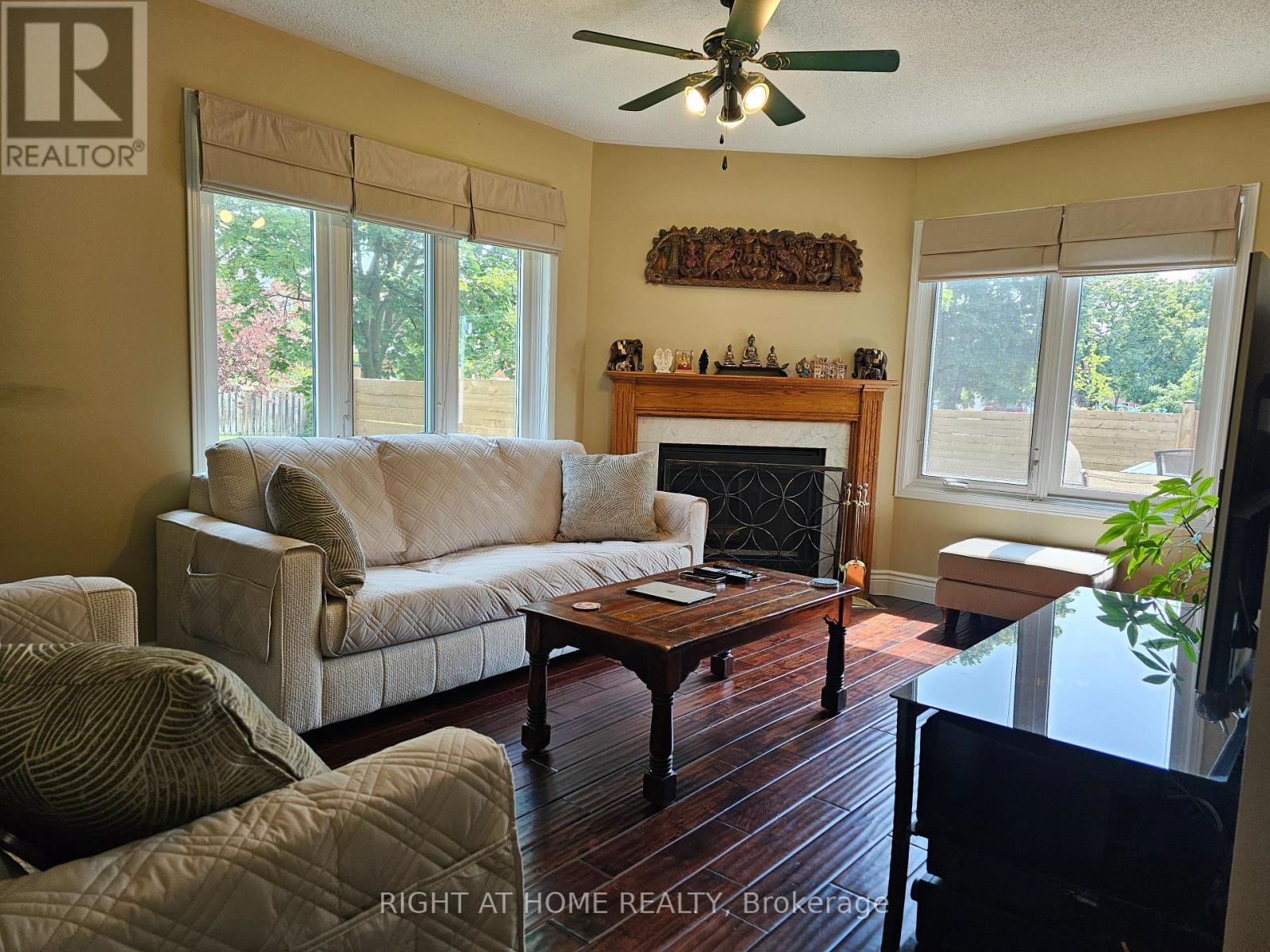 710 Ashprior Avenue, Mississauga, ON - Indoor Photo Showing Living Room With Fireplace