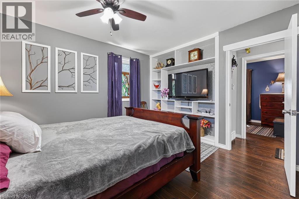 Hardwood-style flooring throughout - 184726 Cornell Road, Tillsonburg, ON - Indoor Photo Showing Bedroom