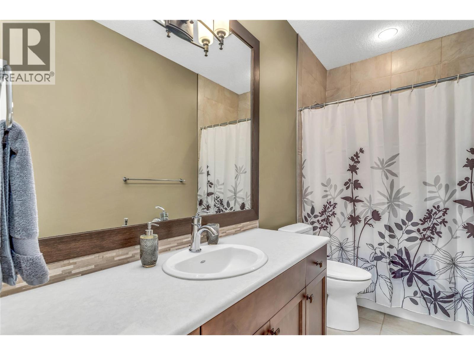 2nd Level Full Bathroom - 8780 Braeburn Drive, Coldstream, BC - Indoor Photo Showing Bathroom