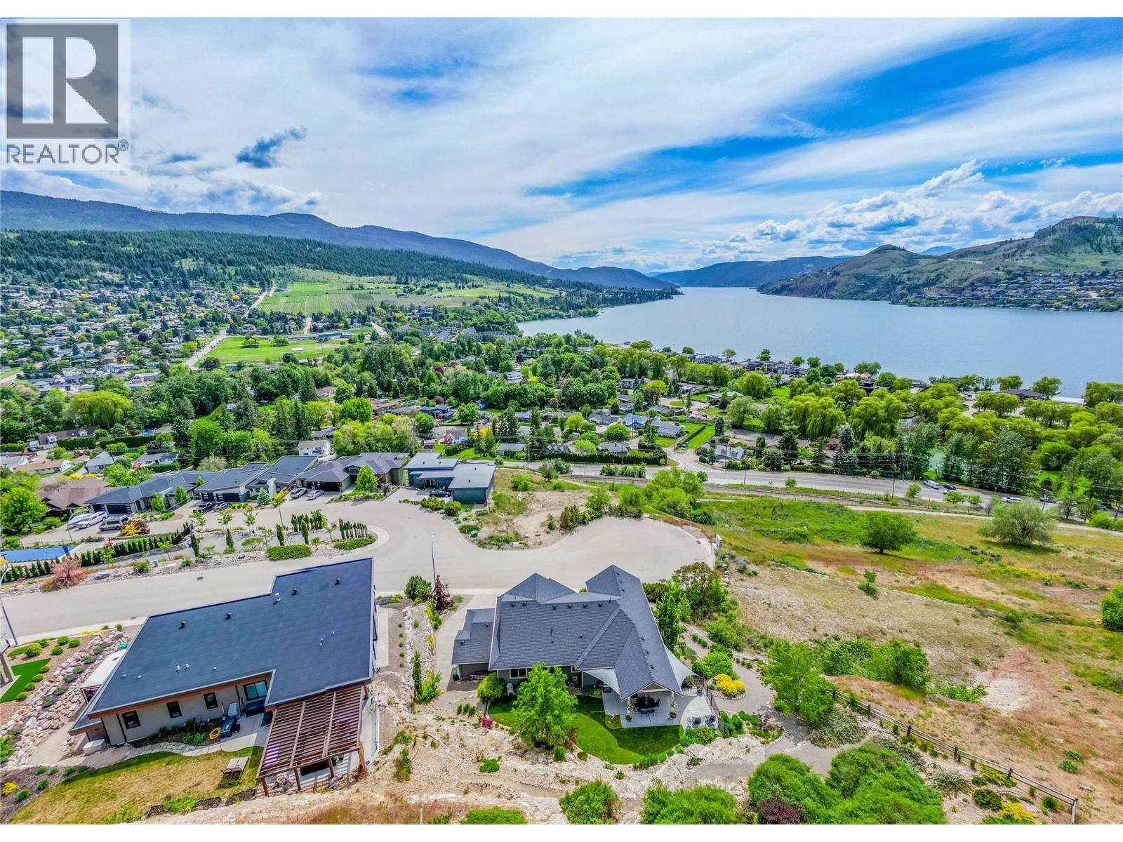 Cul de sac view - 8780 Braeburn Drive, Coldstream, BC - Outdoor With Body Of Water With View